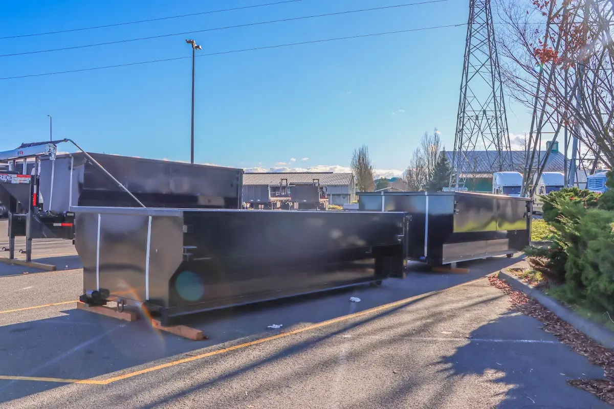 Roll-off dumpster ready for waste disposal at job site for Roofing Dumpster Rental in Taos